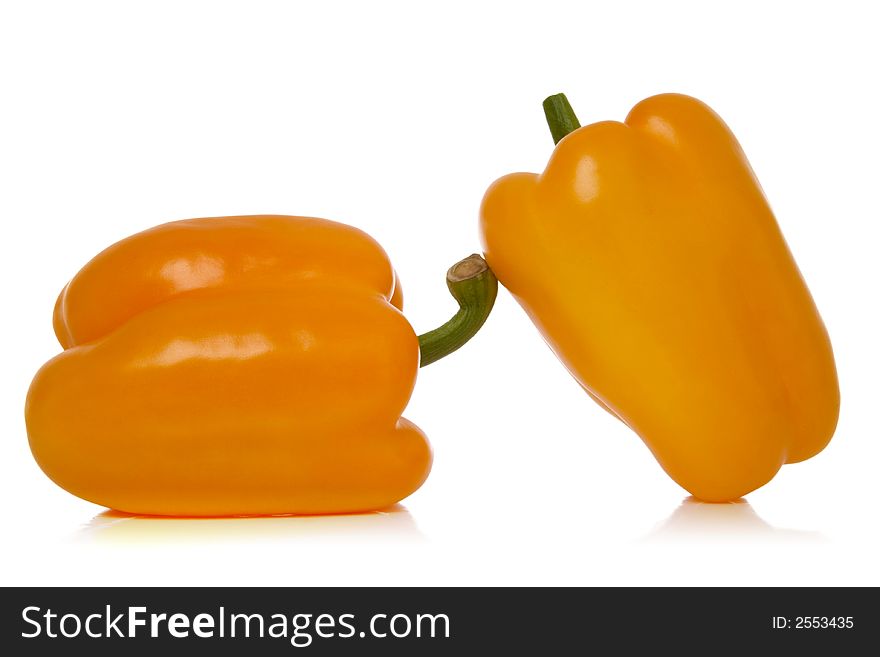 Yellow peppers isolated over white background