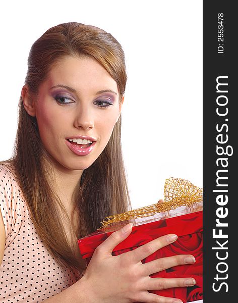 Smiling woman holding a gift box