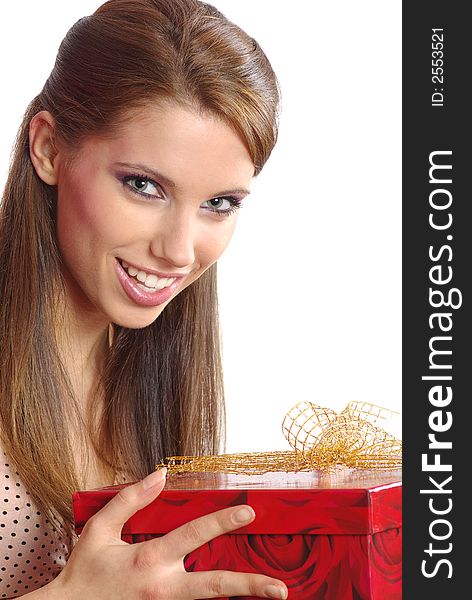 Smiling beautiful girl holding a gift box. Smiling beautiful girl holding a gift box