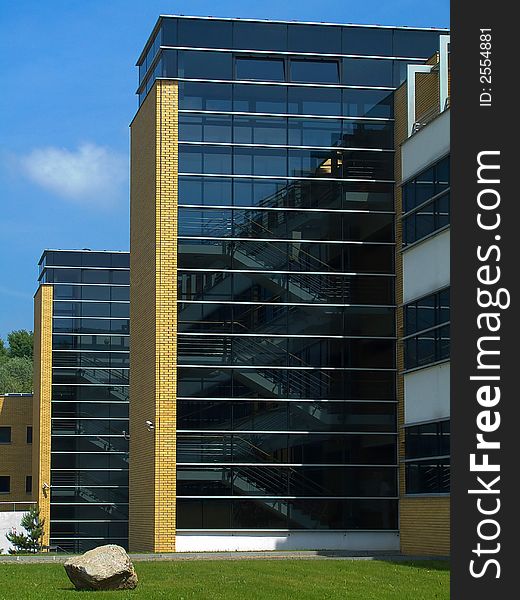 Modern transparent, glazed stairwells in univeristy buidling in Poznna (Poland)