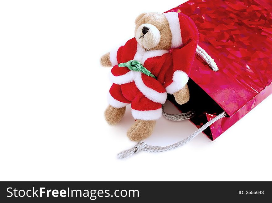 Santa teddy with his gift bag isolatd over white