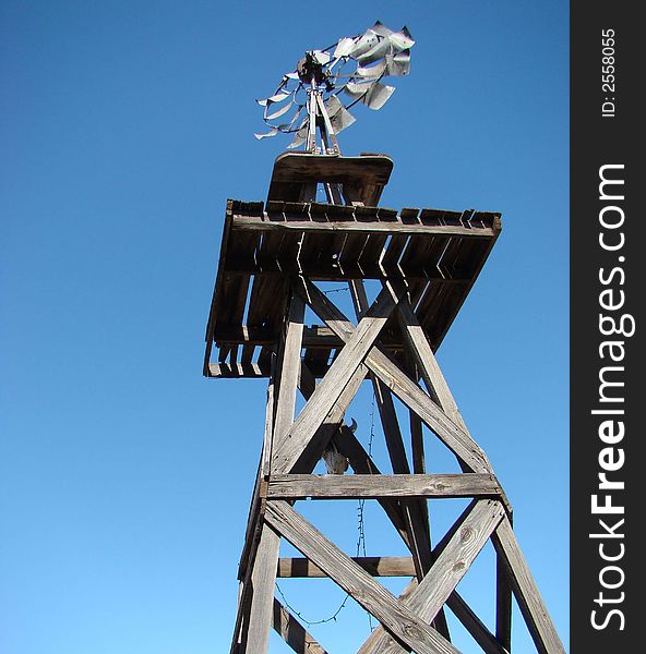 A low-angle rustic windmill in Arizona. A low-angle rustic windmill in Arizona