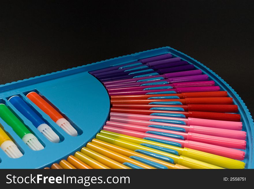 Colorful blue box with drawing pencils. Colorful blue box with drawing pencils