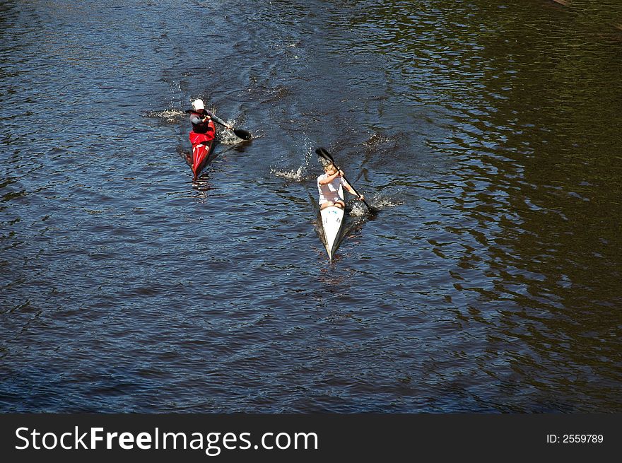 Competition of kayaks on the channel in Riga