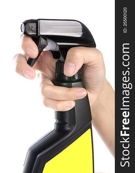 Woman spraying cleaner isolated over white background. You can put your message on yellow area