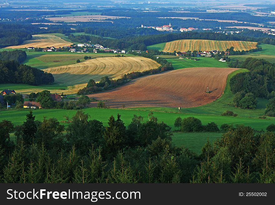 Summer landscape with fields and forests and towns. Summer landscape with fields and forests and towns