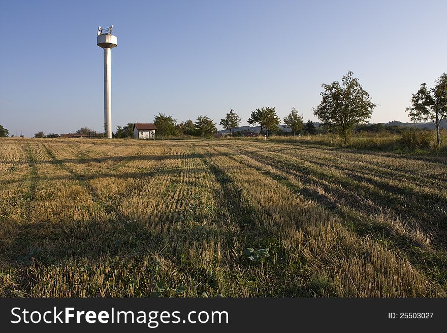 Water tank and harvested field