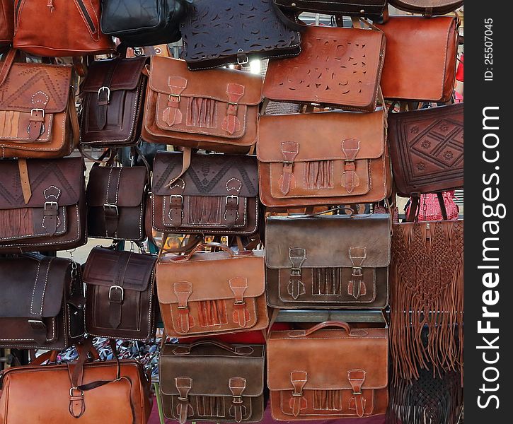 A number of bags on a market stall