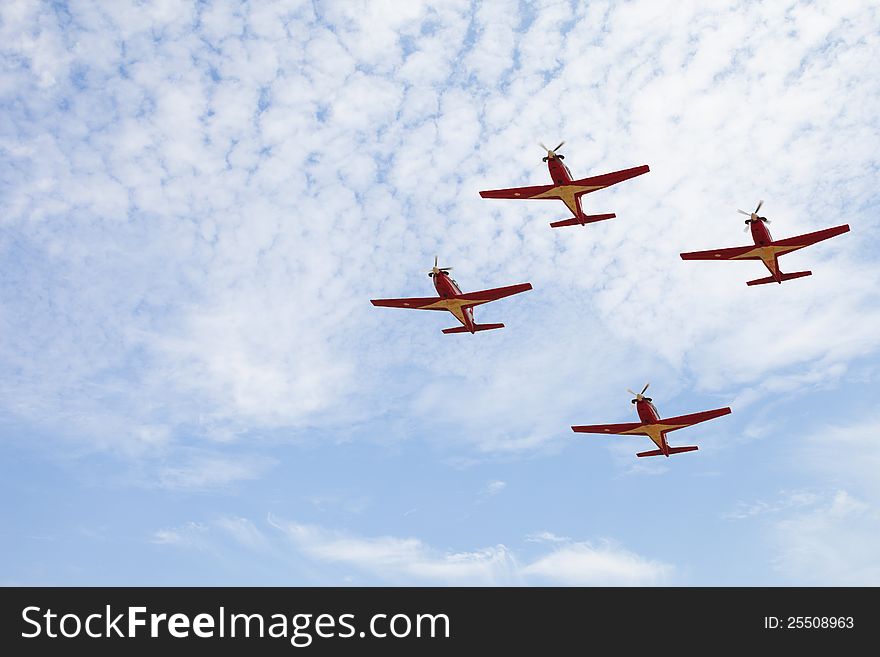 Four airplanes in formation on airshow