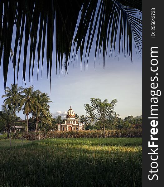 Beautiful small mosque in the middle of rice field