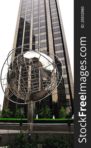 Globe structure at Columbus Circle with cityscape