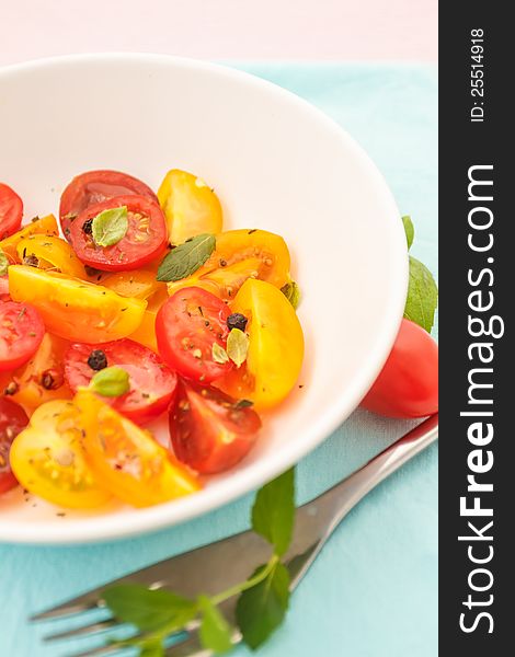 Fresh tomato salad and spice herbs