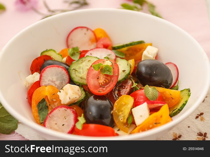 Fresh vegetable salad (tomato, peppers, cucumber, radish, cheese, olive). Fresh vegetable salad (tomato, peppers, cucumber, radish, cheese, olive)