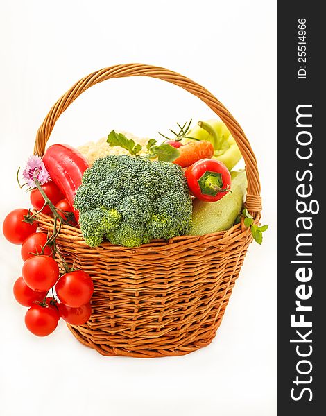Fresh summer vegetables in wooden basket. Fresh summer vegetables in wooden basket