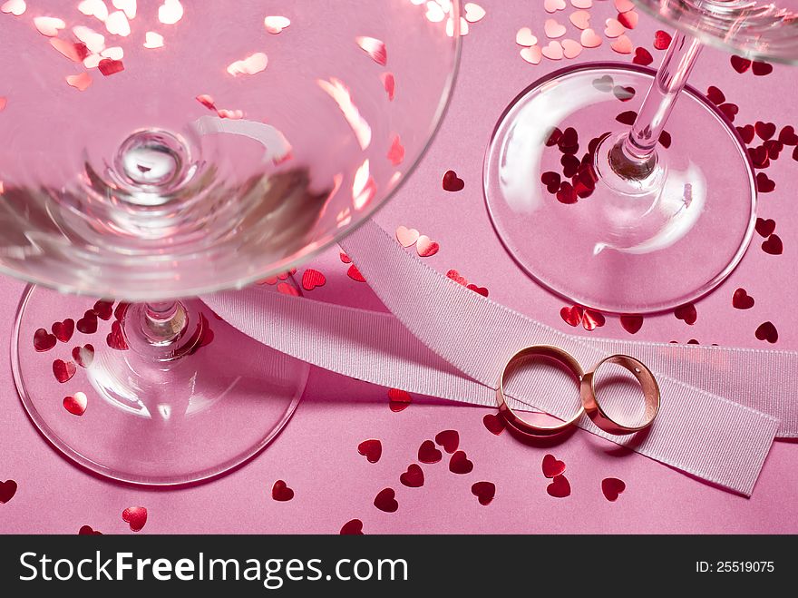 Two wodding rings with wine glass. Two wodding rings with wine glass