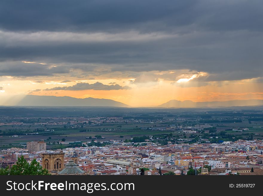 An aerial view of Granada town in Spain at the time of sunset. An aerial view of Granada town in Spain at the time of sunset