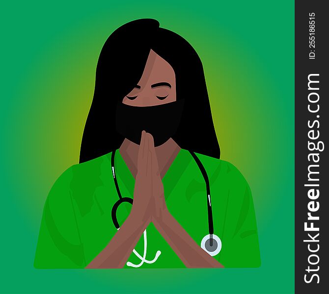Portrait Of A Beautiful Black Female Doctor Praying In A Green Uniform. Black Female Doctor Praying. Black Doctor Portrait. Young