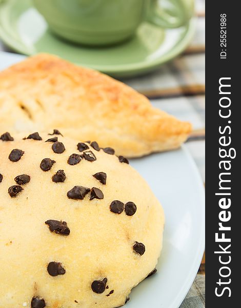 Bread with chocolate chip on dish