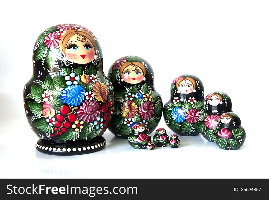 Family of Russian nested dolls on white