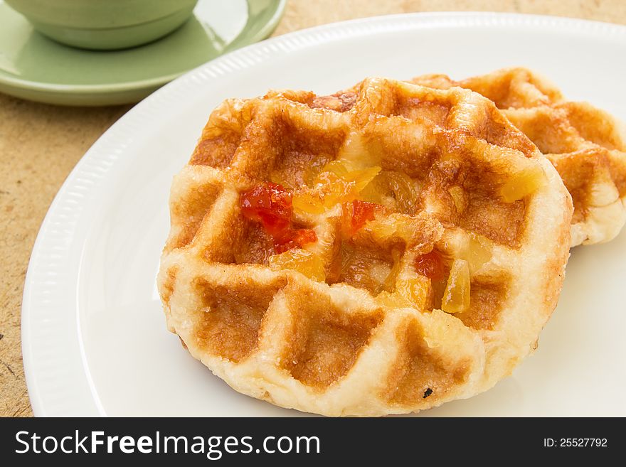 Mixed fruit waffles on dish