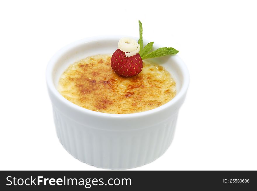 Portion of the cream brulee on a white background. Portion of the cream brulee on a white background
