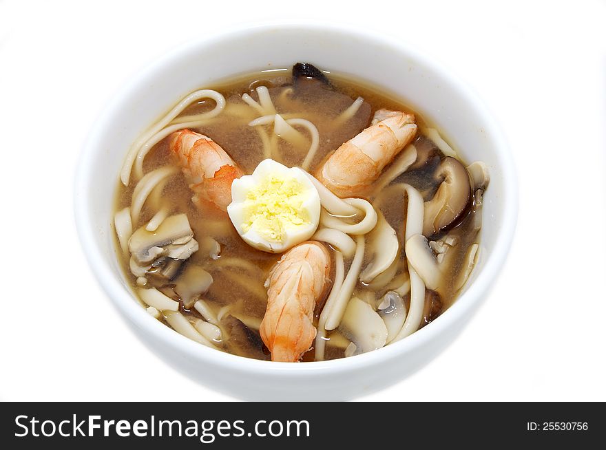 Japanese soup with prawns on a white background. Japanese soup with prawns on a white background
