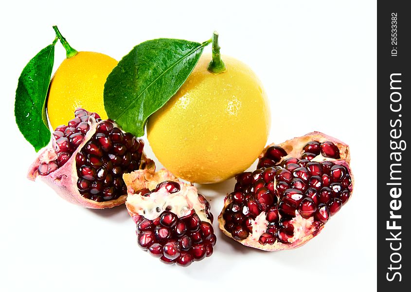 Lemons and parts of pomegranate for breakfast. Lemons and parts of pomegranate for breakfast
