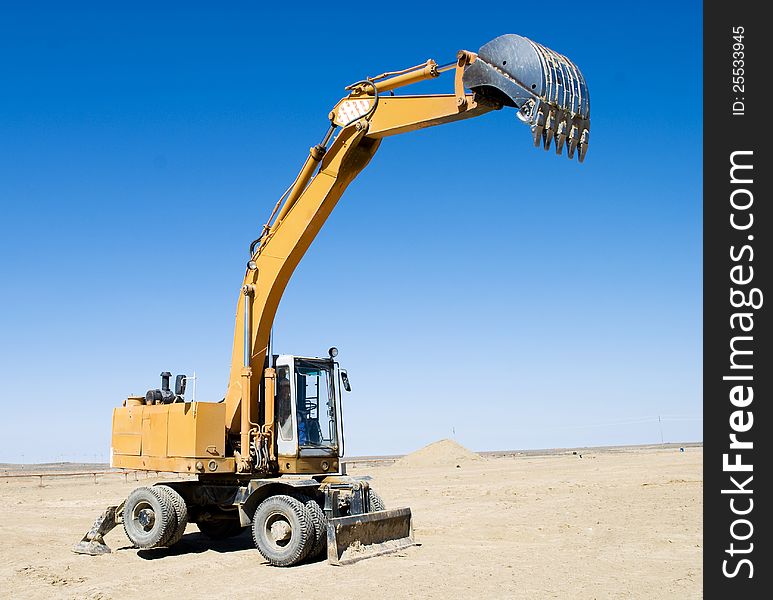 Excavator loader during  works outdoors at construction site