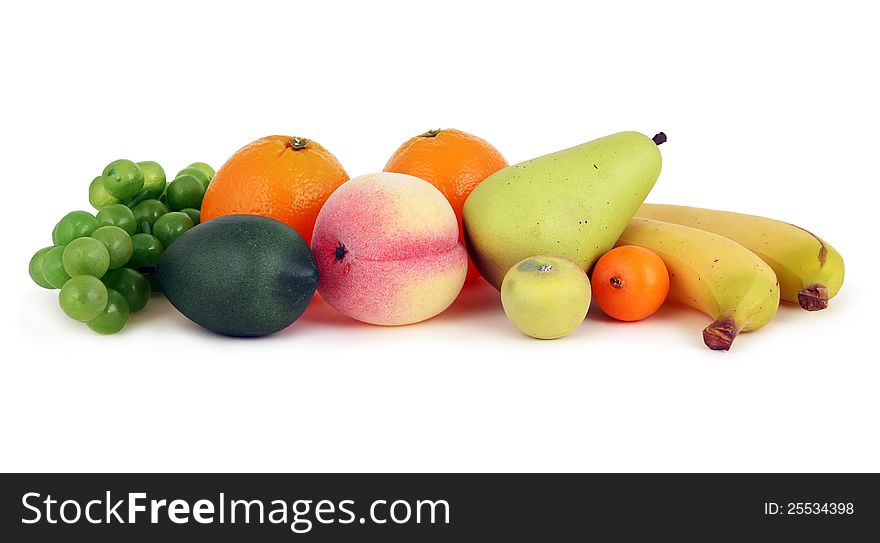 Mixed fruits: pear, peach, bananas, lemon and grape. Mixed fruits: pear, peach, bananas, lemon and grape