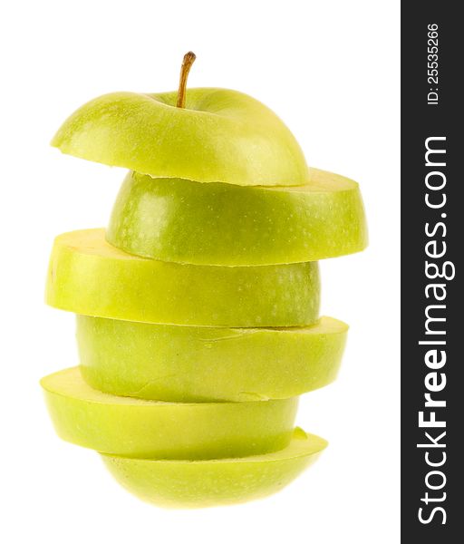 Green pieces of apple isolated on white. Green pieces of apple isolated on white