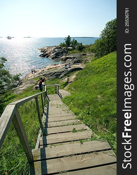 Stairs down to cliff at the Suomenlinna island in Helsinki, Finland.