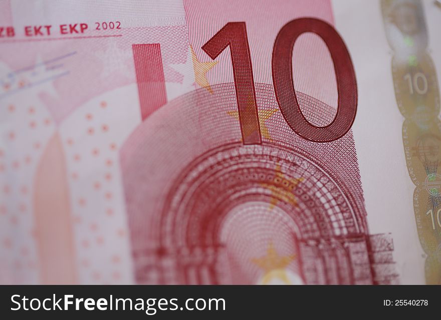 Detail € 10 banknote with a magenta cast
