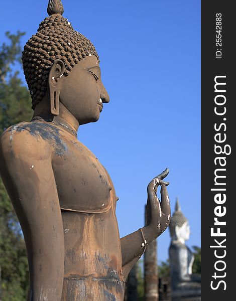 Standing Buddha statue at Sukhothai