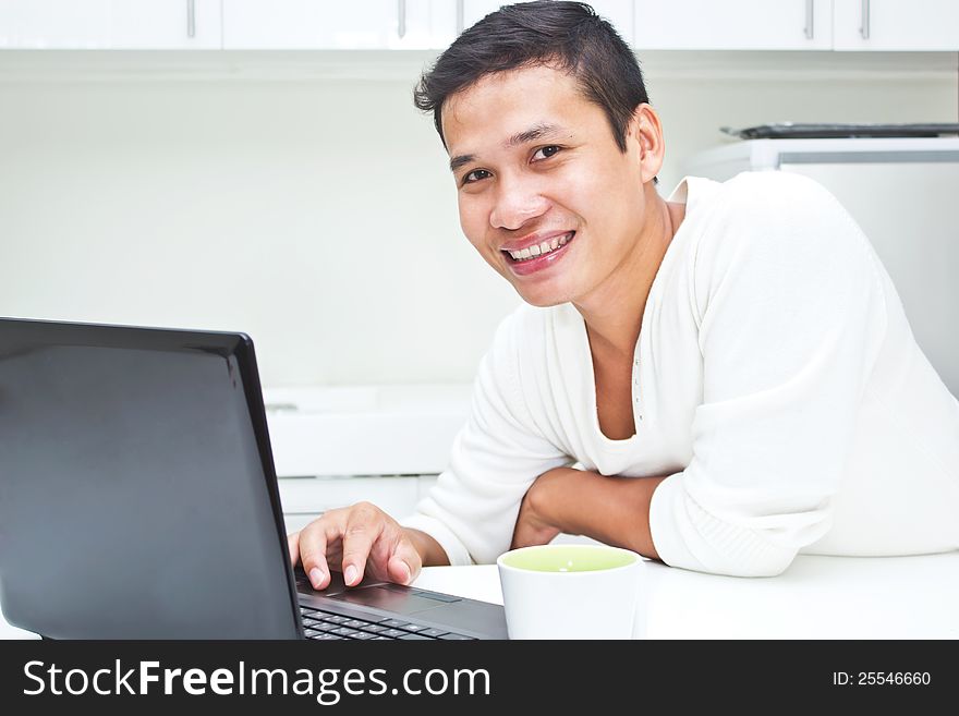 Cute asian young Man  with Laptop