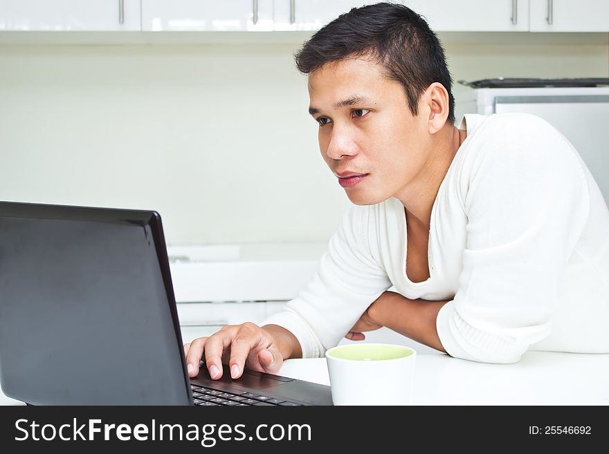 Cute asian young Man with Laptop. Cute asian young Man with Laptop