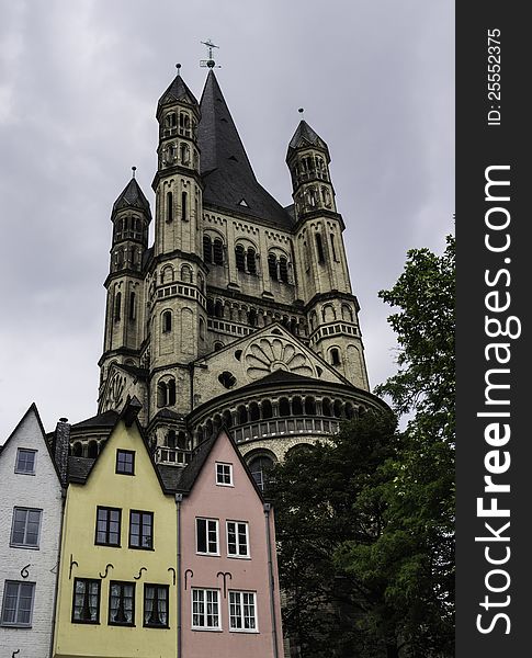 Great Saint Martin Church (in German: Gross Sankt Martin) is one of the many churches of the ancient German city of Cologne in the federal state of Northrhine-Westphalia (Nordrhein-Westfalen).
The Great Saint Martin Church is a Romanesque Catholic church. Founded circa 960 AD, it rests on the remnants of a Roman chapel. The colorful old houses are built very near to the church.