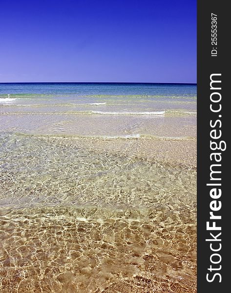 Beautiful tropical beach with cristal clear water and golden sand