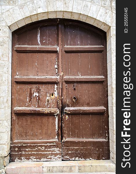 The wooden door on the old walls in Jerusalem