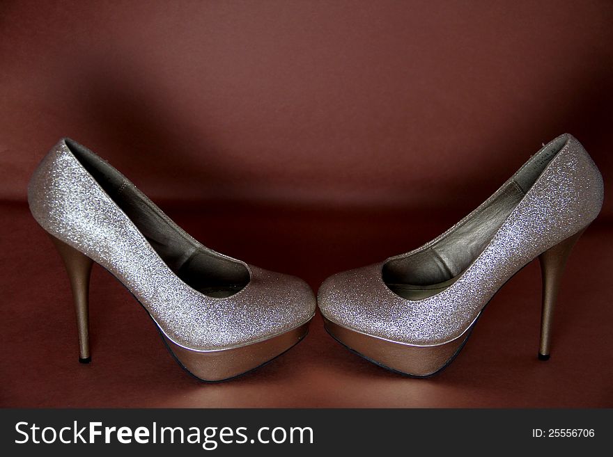 Gold glitter fashion high heeled shoes. Gold glitter fashion high heeled shoes