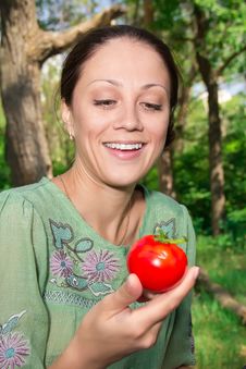 A Woman With A Tomato Stock Image A Woman With A Tomato Stock Image