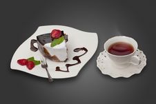Cake With Strawberry And A Cup Of Tea Stock Images