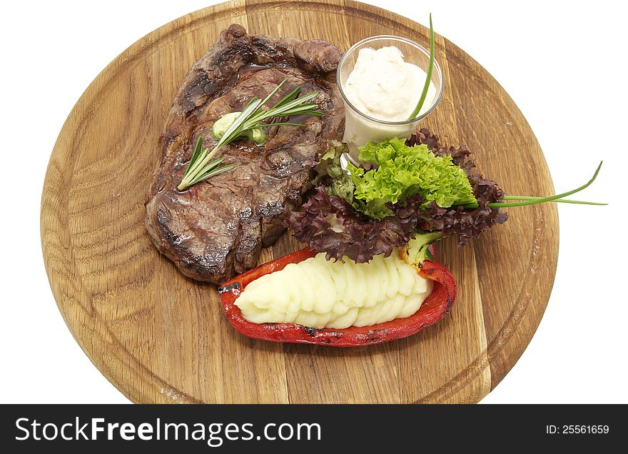 Steak sauce and greens on a white background. Steak sauce and greens on a white background