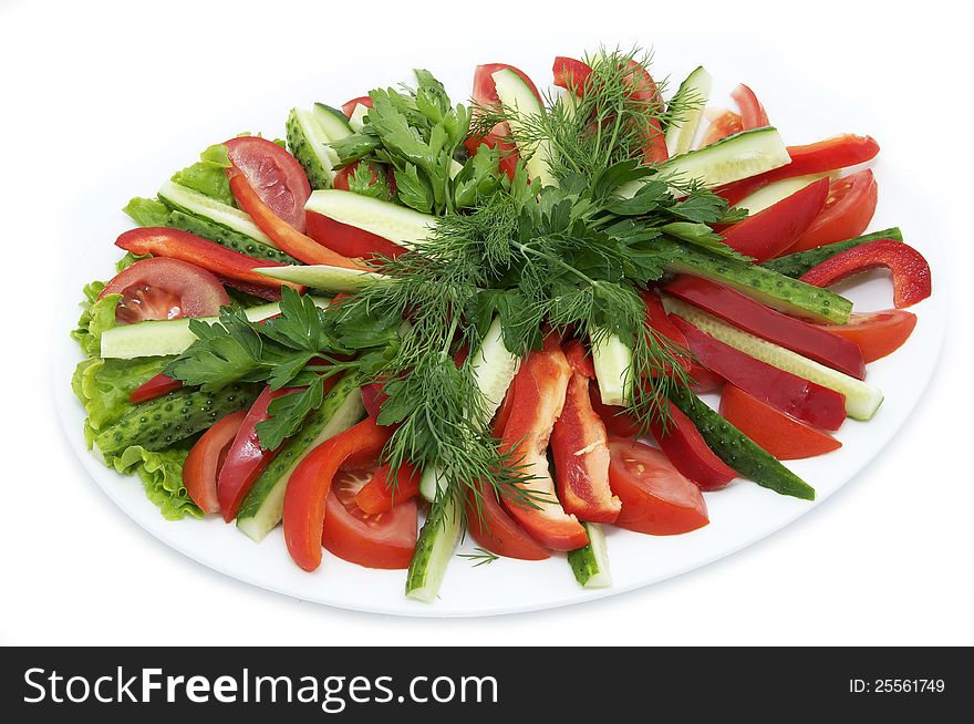 A plate of tomatoes and cucumbers, peppers. A plate of tomatoes and cucumbers, peppers