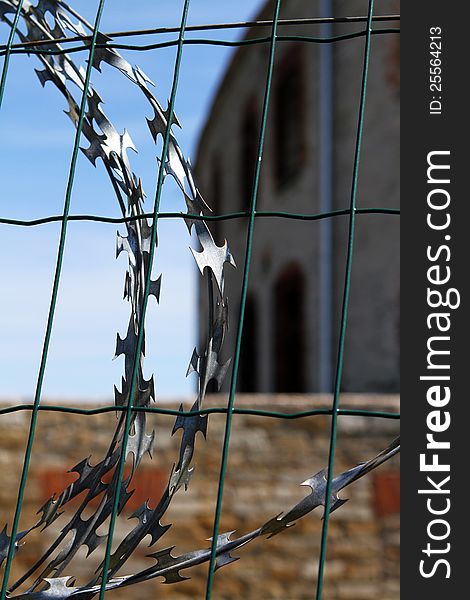 Old Soviet prison fence razor wire. Old Soviet prison fence razor wire