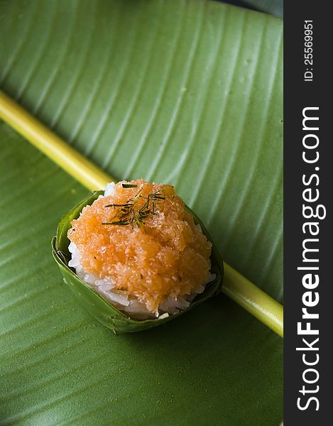 Thai dessert sweet sticky rice on green banana leaf. Thai dessert sweet sticky rice on green banana leaf