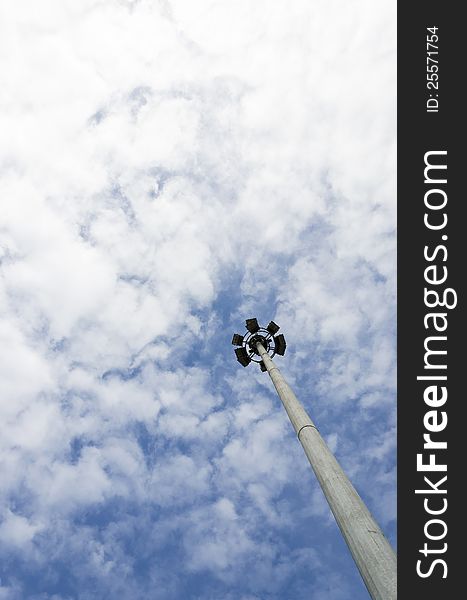 Lamp post under blue sky