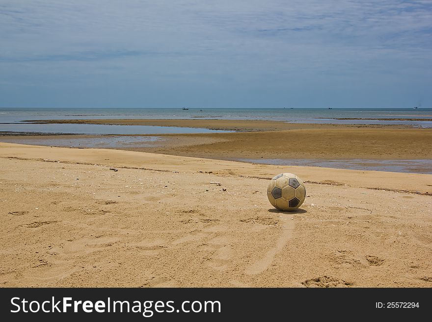 Old Soccer Ball On Beach