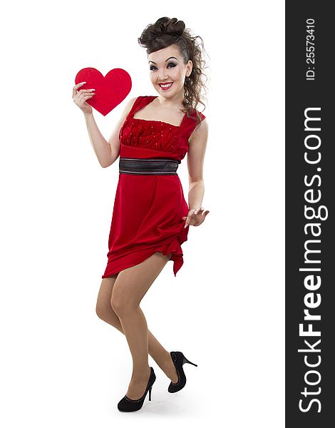 Beautiful Asian woman in a red dress shows the heart form - a love symbol. Beautiful Asian woman in a red dress shows the heart form - a love symbol