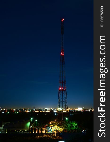 Telecom antennas at night sky