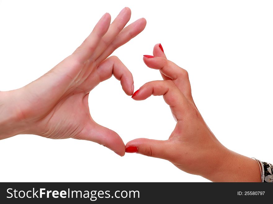 Women's and men's hands gesturing heart sign together isolated on white background. Women's and men's hands gesturing heart sign together isolated on white background